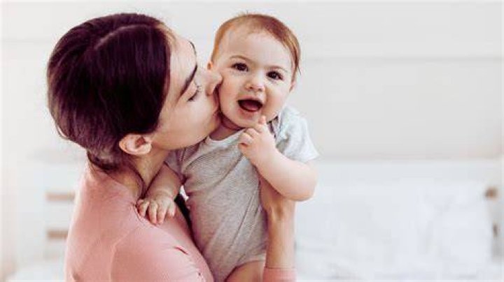Can parents kiss their newborn baby?