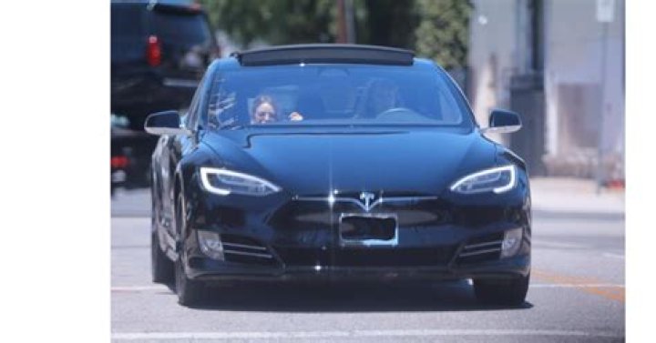 Does Miley Cyrus own a Tesla?