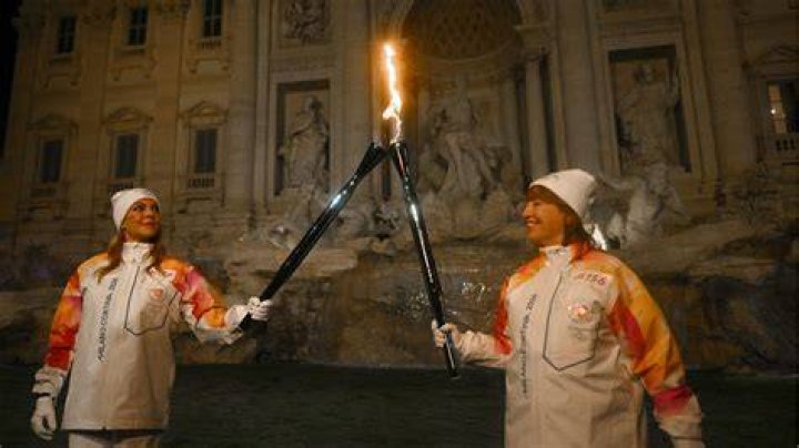 How do they keep the Olympic torch lit?