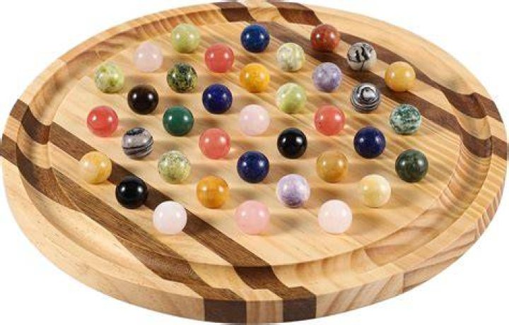 How many holes does a solitaire board have?