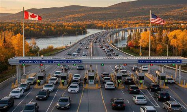 How many people cross the Canadian border a day?