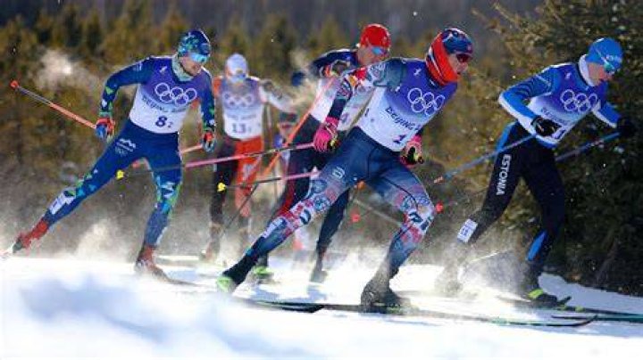 In which sport do athletes compete in cross-country skiing and ski jumping?