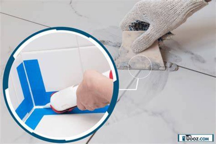 Is it OK to put silicone over grout?