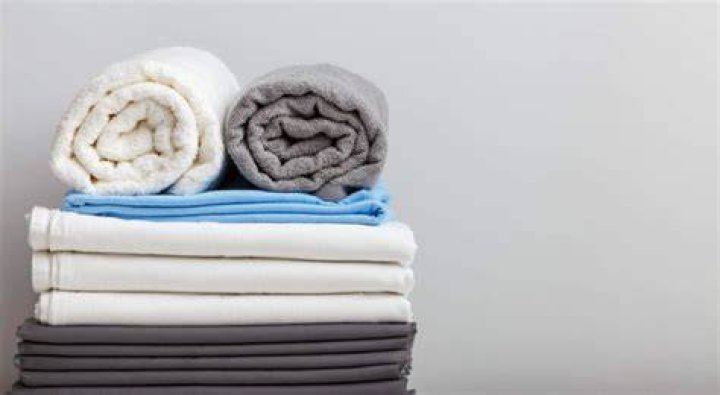 Is it OK to wash sheets and towels together?