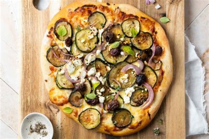 Is leftover pizza better cold or hot?