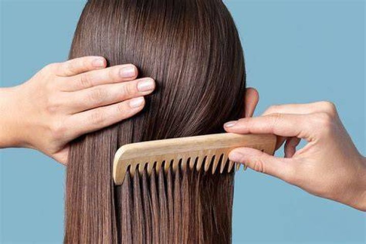 Should I comb my hair in the shower?