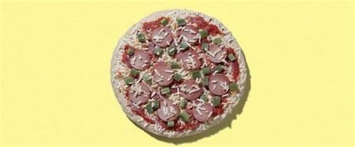 Should I thaw a frozen pizza before baking?