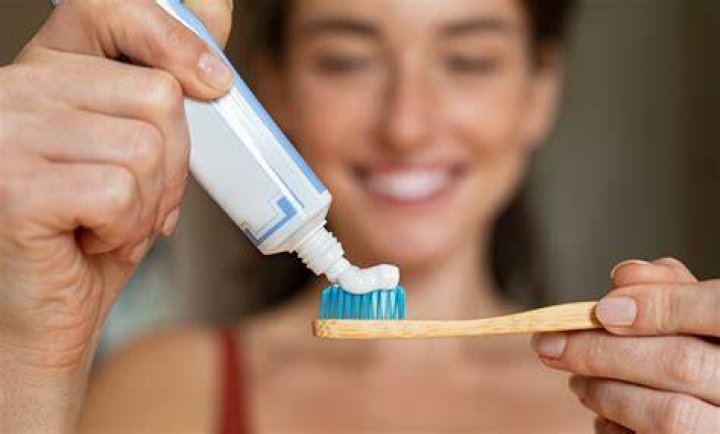 Should you leave toothpaste in your mouth after brushing?