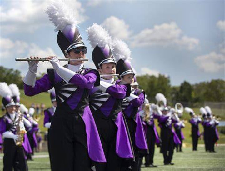 What do marching bands represent?