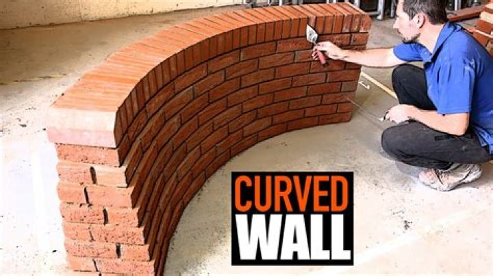 What is a curved brick wall called?