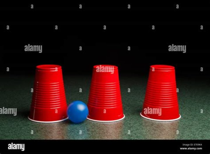 What is the name of the game with three cups and a ball?