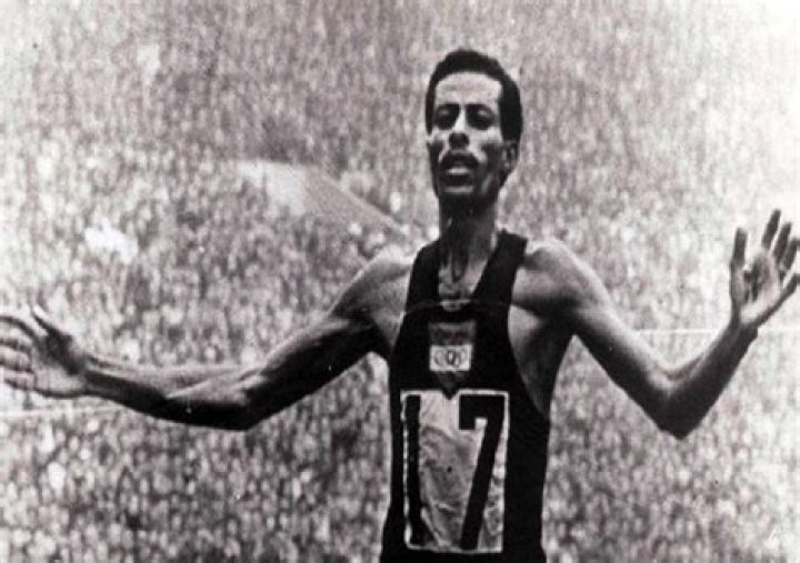 Who was the first black African to win a gold medal in the Olympics?