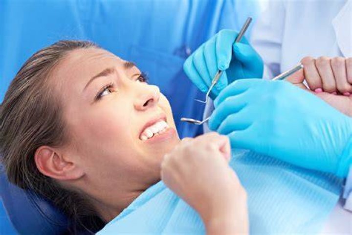 Why do dentist poke your teeth?