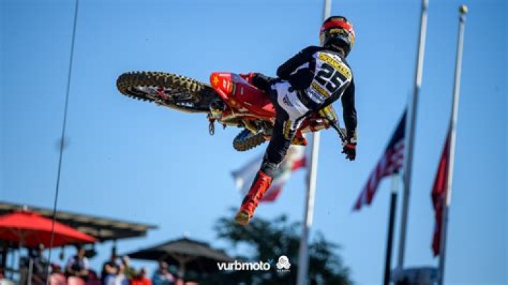 Why do motocross riders whip in the air?