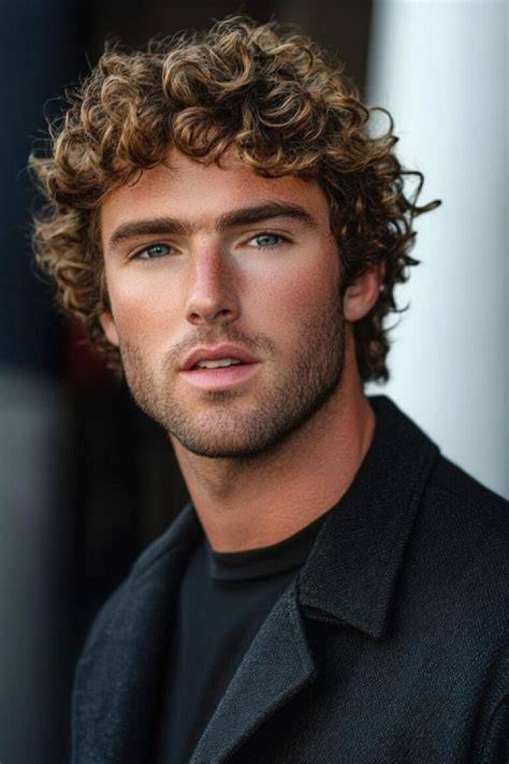 Why is curly hair attractive?